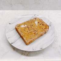 a piece of toast on a plate