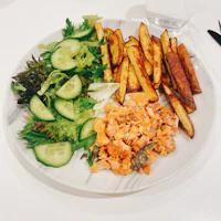 a plate of food on a white table